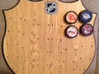 Шайбы NHL (коллекционированные) с настенной доской объявление продам