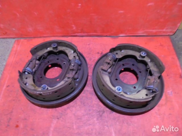 Isuzu ELF Опорный диск с колодками и ртц