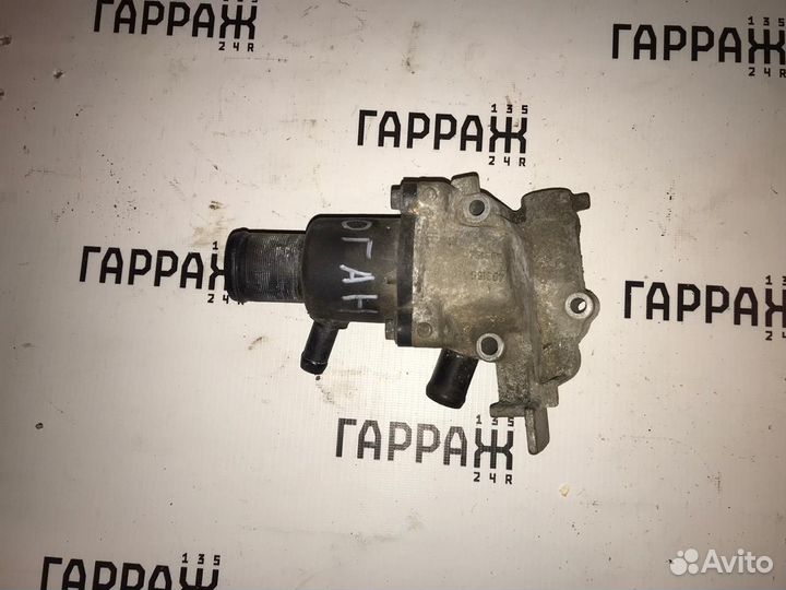 Корпус термостата Renault Logan