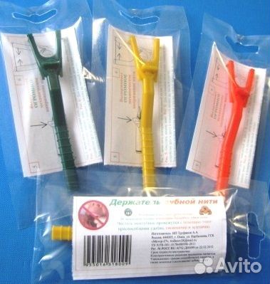 Держатель зубной нити (флоссер)