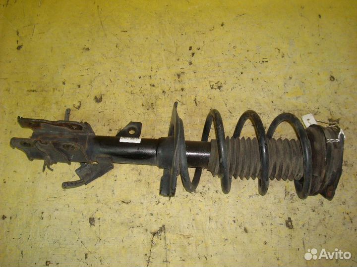 Стойка Nissan Serena NC25 (Переднее Правое)