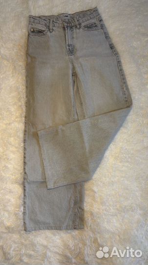 Джинсы клеш женские