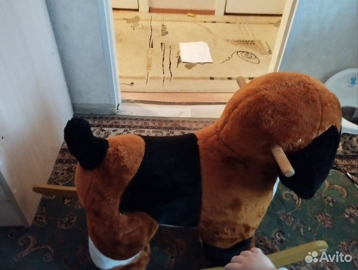 Собака качалка