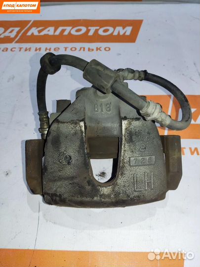 Суппорт тормозной передний левый Mazda 3 BK рест