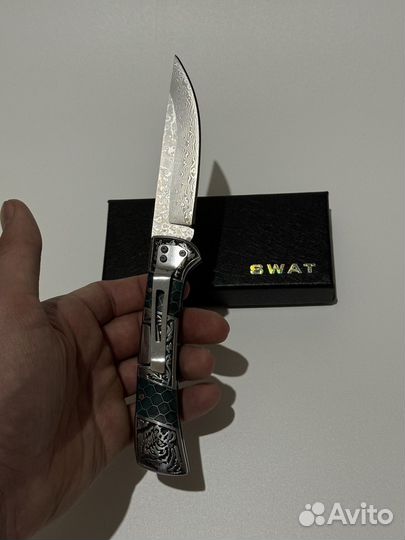 Складной нож из дамасской стали