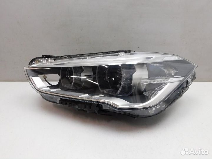 Фара левая BMW X1