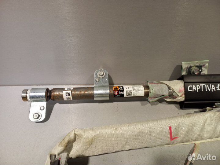 Шторка безопасности левая Chevrolet Captiva LE9