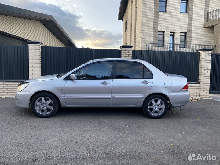 Mitsubishi Lancer 1.6 AT, 2005, 240 150 км