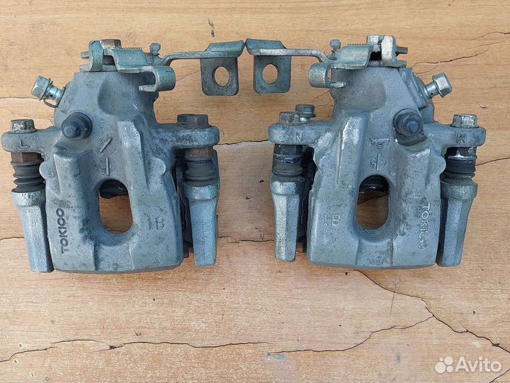 Суппорт тормозной задний тойота королла 150