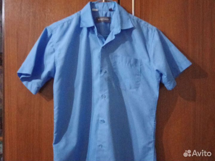 Продам рубашку для мальчика р 140-146