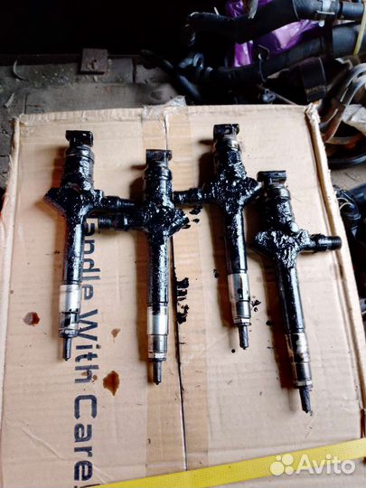 Форсунки двигателя RF7J