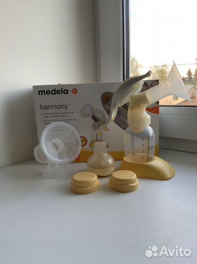 Молокоотсос ручной medela двухфазный+бутылочки+сос
