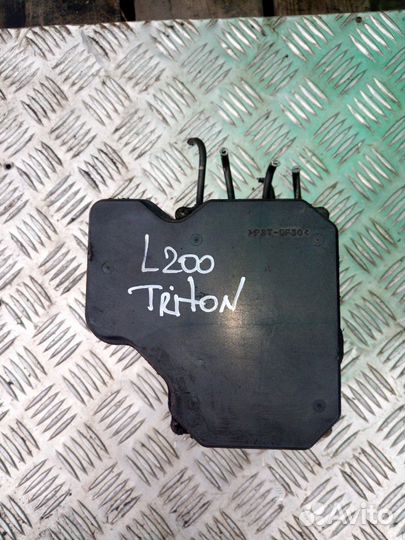 Блок абс Мицубиси л 200