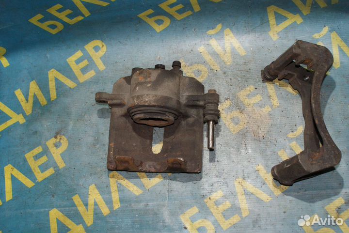 Суппорт передний + скоба Chrysler Voyager 4