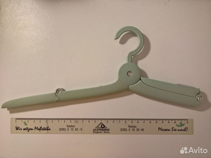 Портативная складная вешалка для одежды