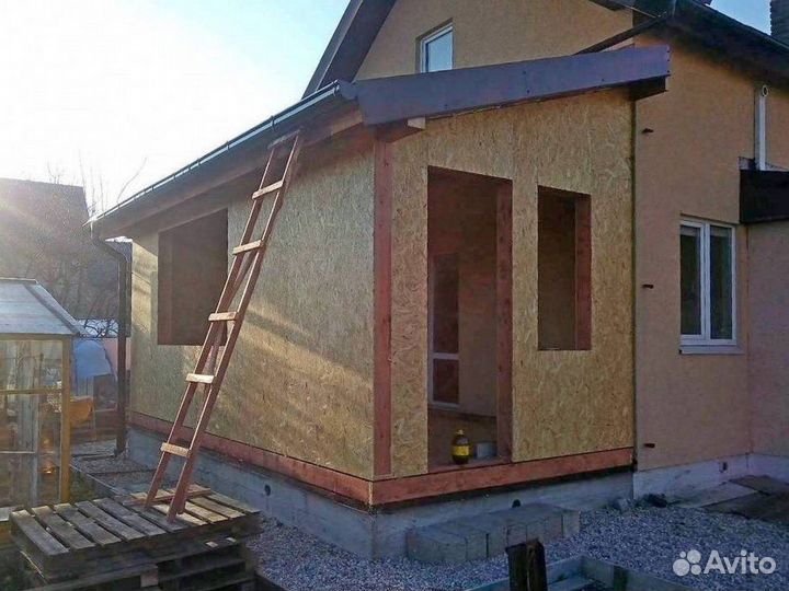 Бригада строителей пристройки кровельные работы