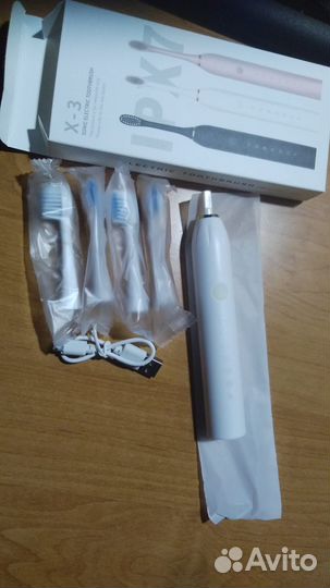 Электрическая зубная щётка