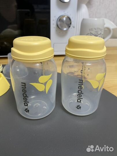 Молокоотсос medela с бутылочками