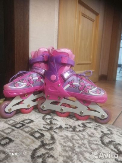 Коньки роликовые