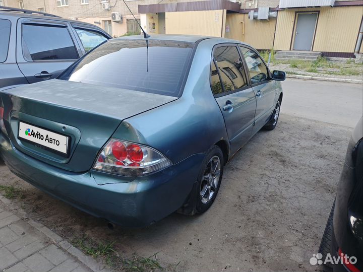 Mitsubishi Lancer 1.6 МТ, 2006, 237 500 км