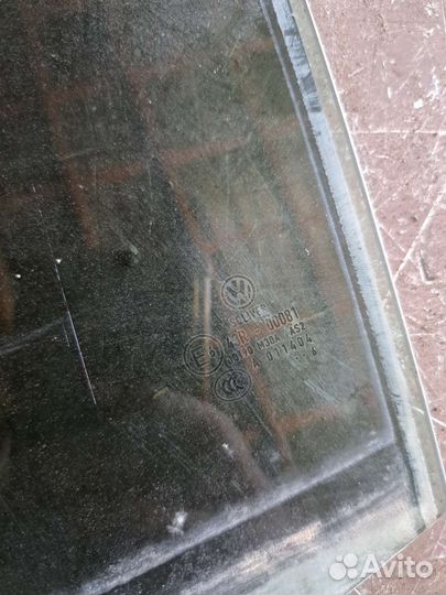 Стекло двери задний левый Volkswagen Passat B6