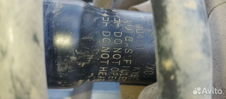 Задний амортизатор Ниссан wingroad