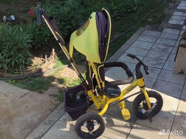 Детский трехколесный велосипед с ручкой