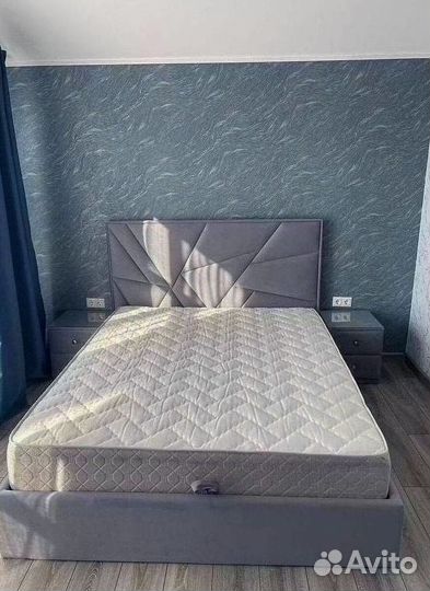 Кровать с подъемным механизмом