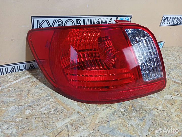 Фонарь левый Kia Rio 2 (05-11г)