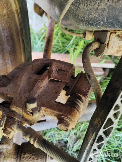 Задний суппорт Шевроле Лачетти