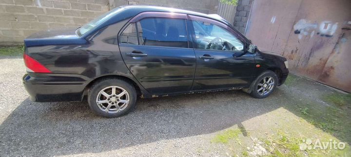 Mitsubishi Lancer, 2002