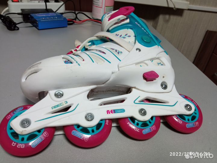 Роликовые коньки