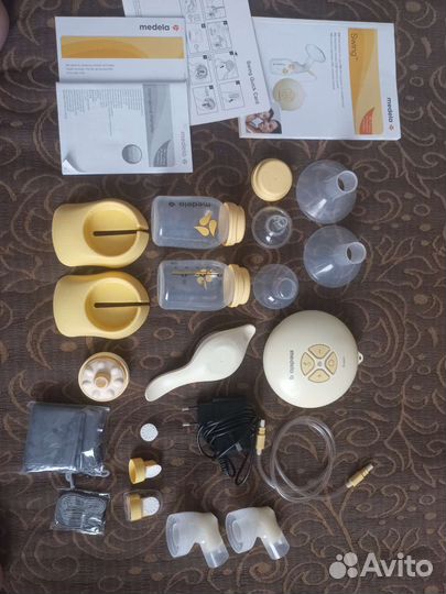 Молокоотсос medela