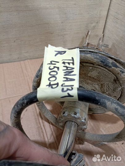 Амортизатор подвески передний правый Nissan Teana