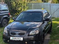 Kia Rio 1.4 AT, 2010, 248 000 км, с пробегом, цена 599 000 руб.