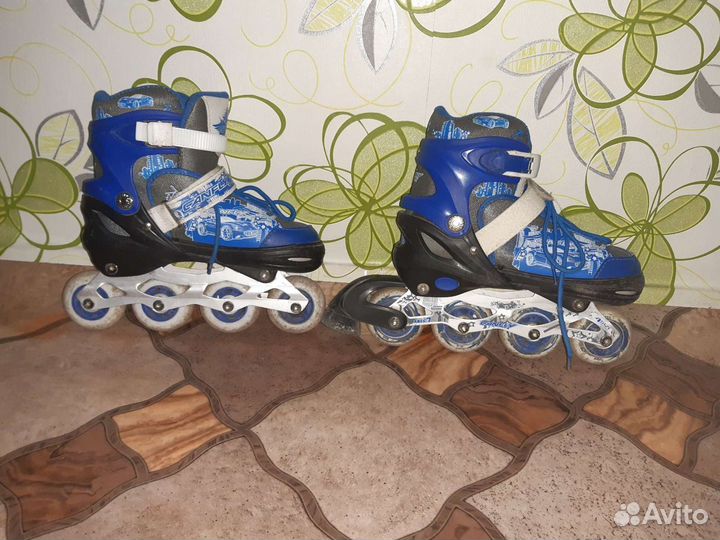 Роликовые коньки