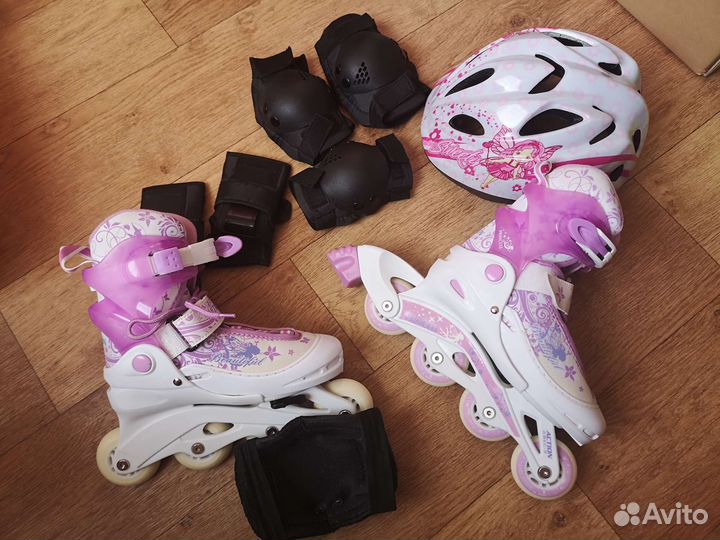 Роликовые коньки