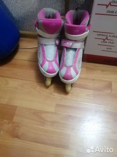 Роликовые коньки