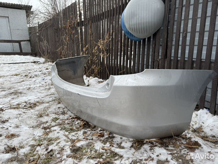 Задний бампер Toyota Fielder NZE141