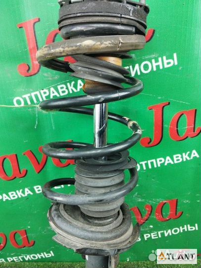 Стойка передняя левая mazda demio