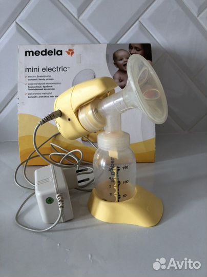 Молокоотсос medela электрический 2в1