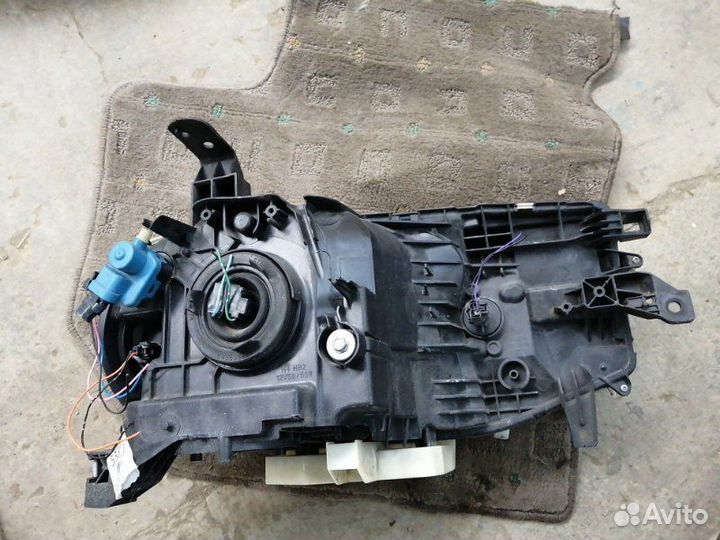 Фара передняя левая Nissan Cube Z12