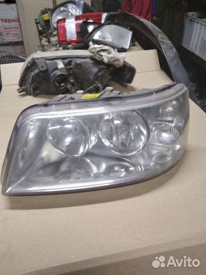 Фара левая volkswagen 7H1941015L