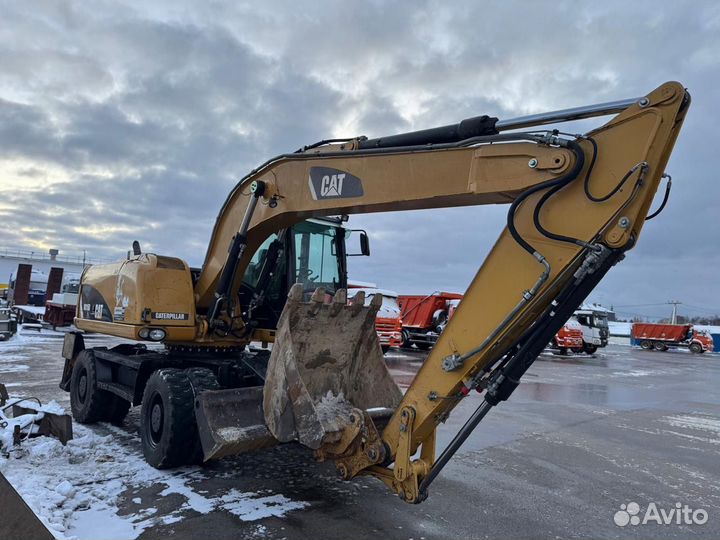 Колёсный экскаватор CAT M315, 2013