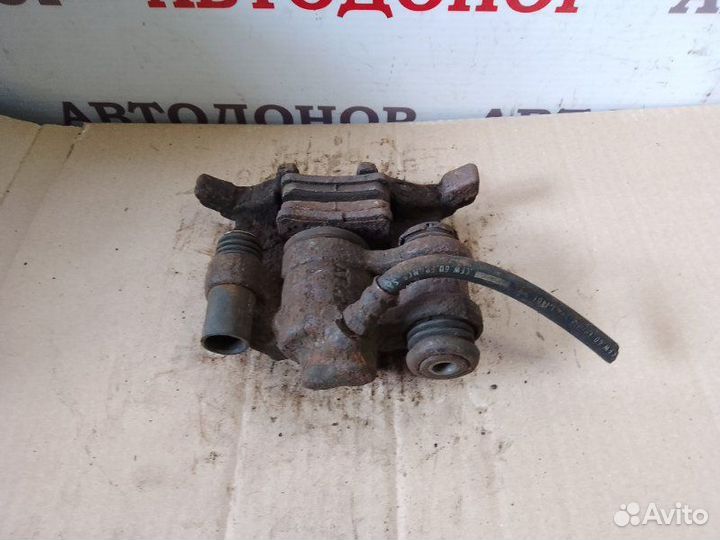 Суппорт тормозной задний левый Peugeot 605