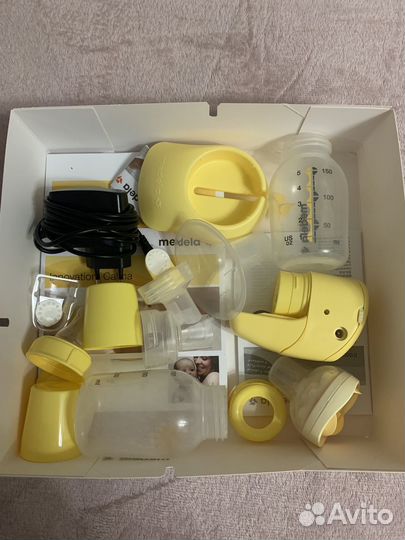 Молокоотсос medela mini electric