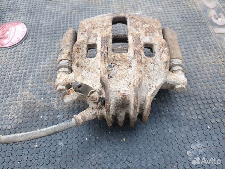 Суппорт тормозной передний левый Peugeot 406 Пежо