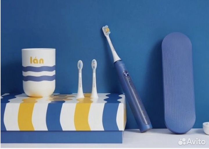Электрическая зубная щётка