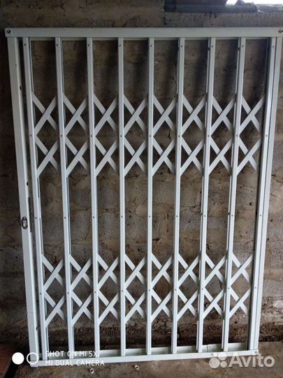 Раздвижные решётки на двери (гармошки)