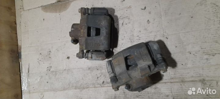 Суппорт тормозной передний левый нексия